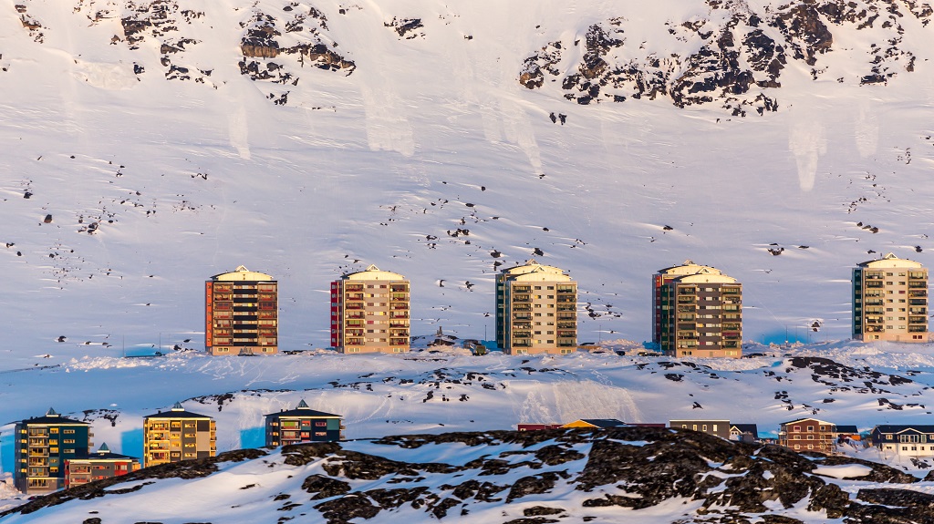 Greenlandic multistorey living buildings with mountains in the background, Nuuk, Greenland